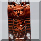 G25. Art glass with impressed tiger. Some flaking to color. 6”h - $12 